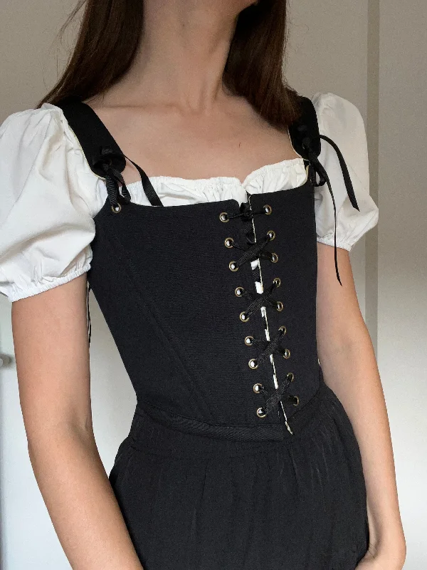 Corset with exposed boning-Reversible black/buttercream yellow corset with removable shoulder straps